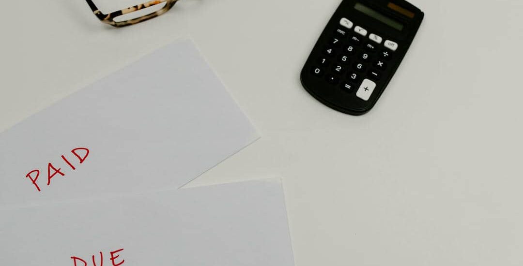 How can I cut expenses to pay off debt faster