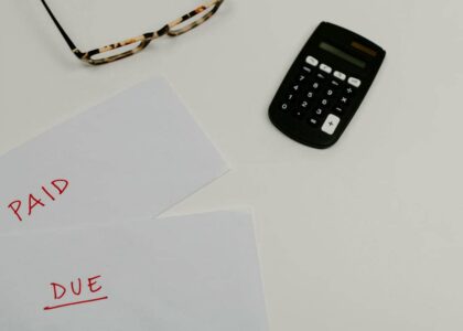 How can I cut expenses to pay off debt faster